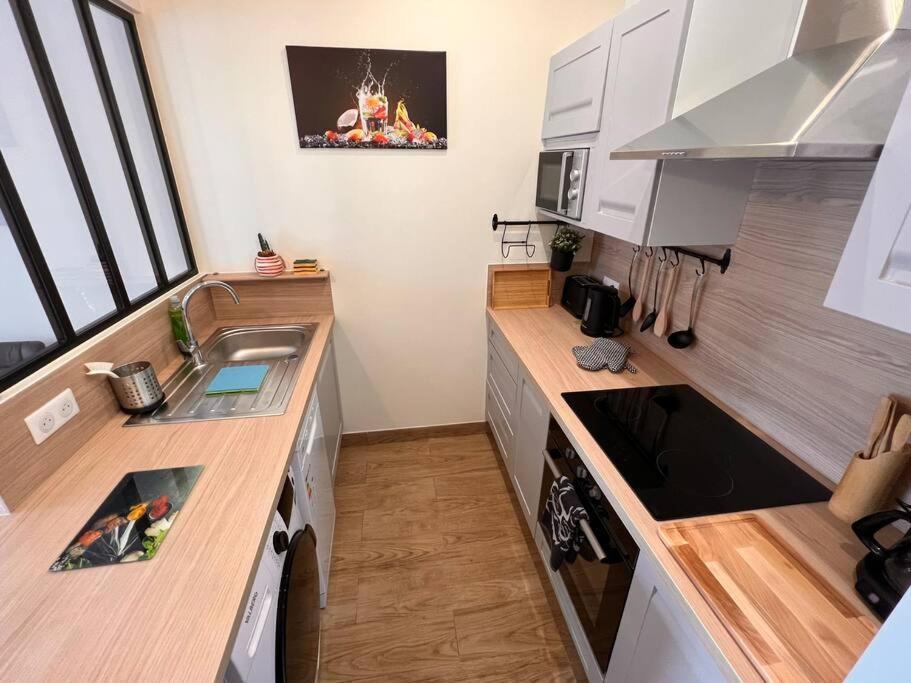 Appartement 15Min De Paris ดร็องซี ภายนอก รูปภาพ